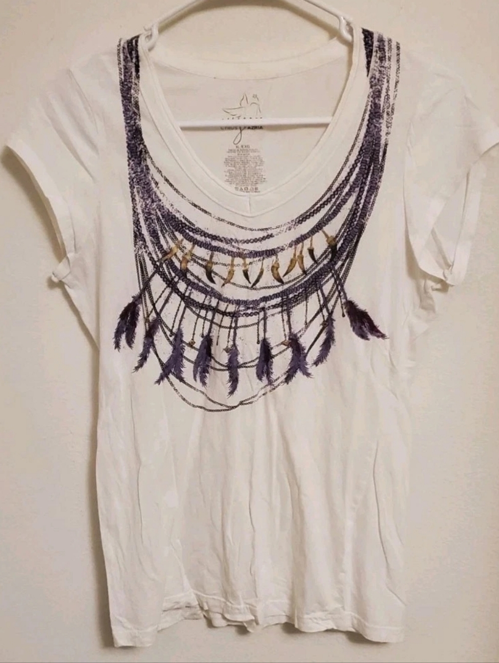 Miley Cyrus And Max Azria White V-Neck Tee with Purple Feather Necklace Print